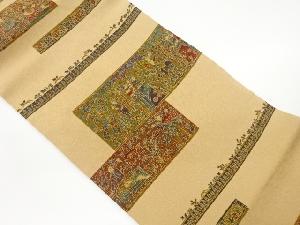 縮緬地民族人物に鳥獣・草花模様名古屋帯